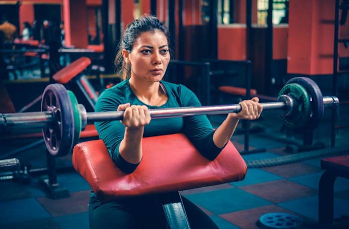 Straight Bar Bicep Curl _ Source iStock